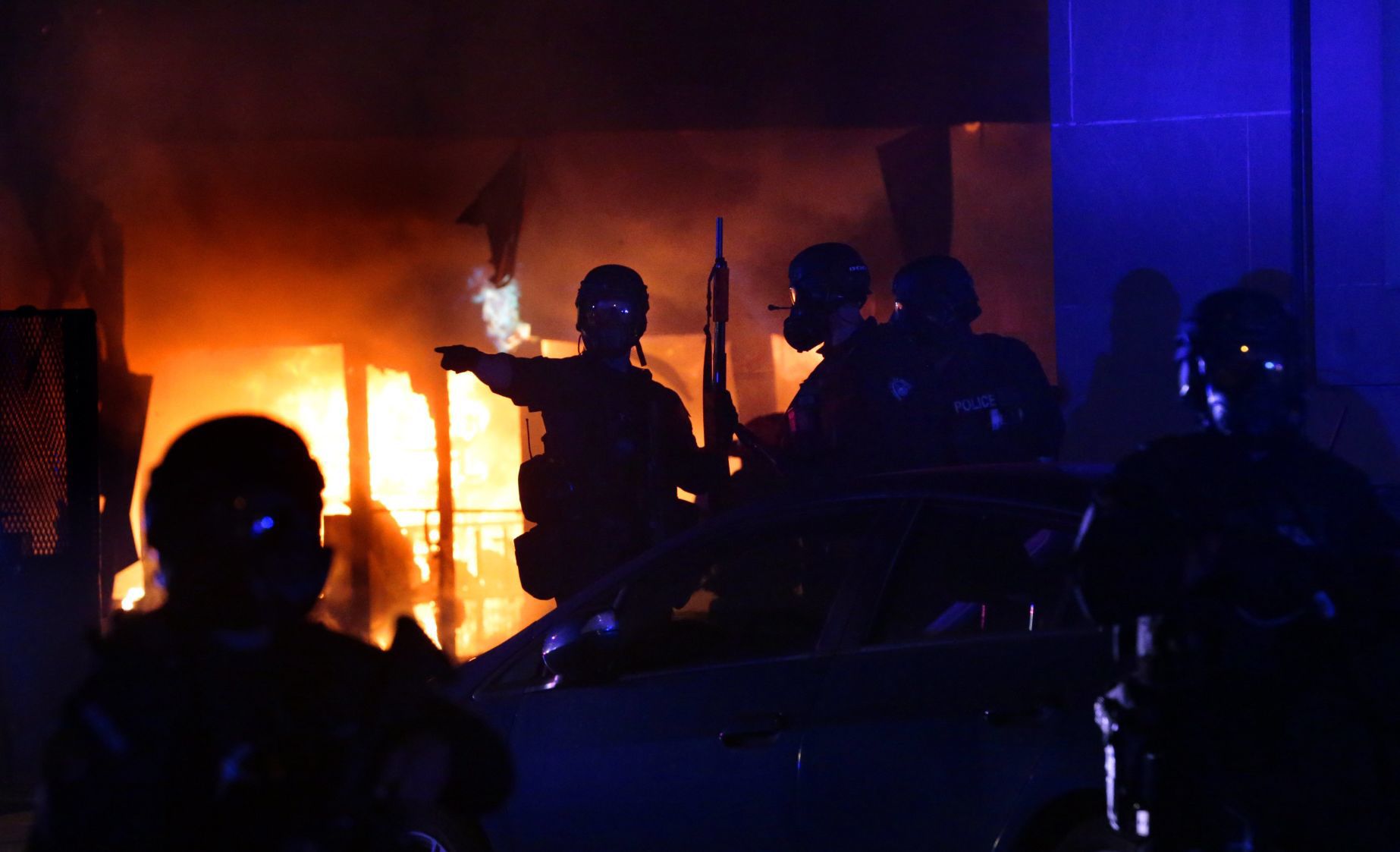 Vandals set fire to downtown 7-Eleven following protest at police station